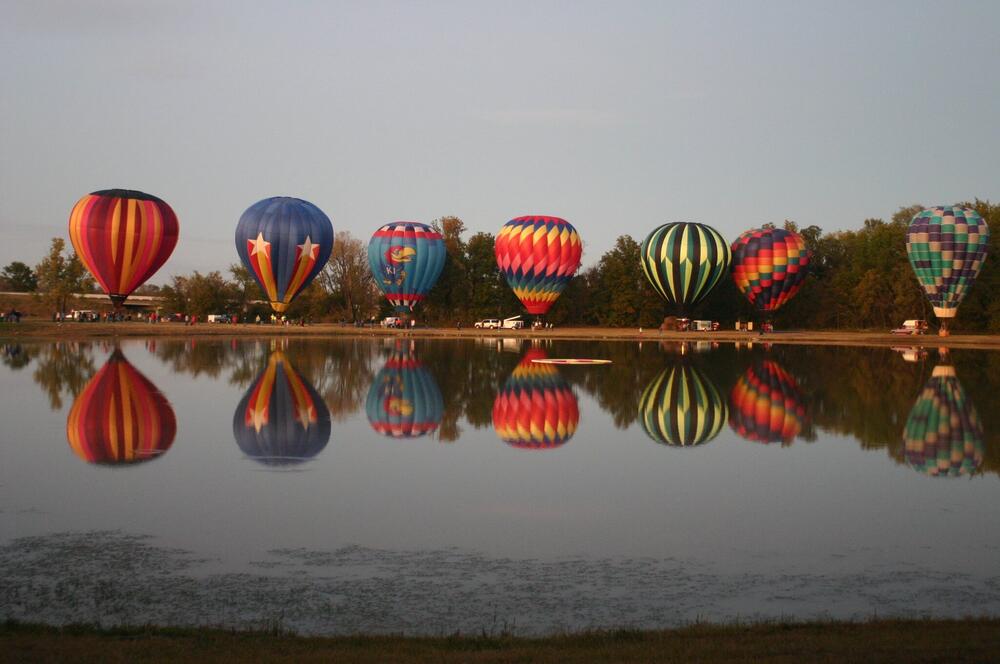 A line of 7 hot air balloons