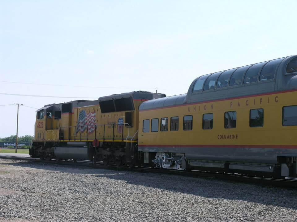 Side view of the yellow Union Pacific Columbine train